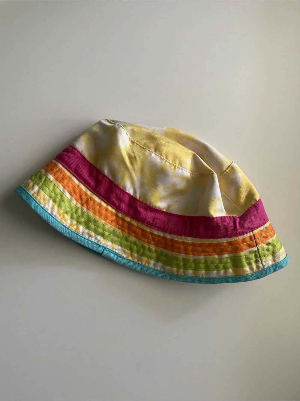 Paw Patrol Rainbow Stripe Reversible Bucket Hat in Yellow, Pink, Orange & Blue